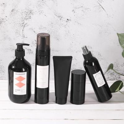 China Cosmetic whole set 30ml 50ml 100ml 150ml 200ml 250ml matte black dark lotion essential oil cosmetic bottle and jar for sale