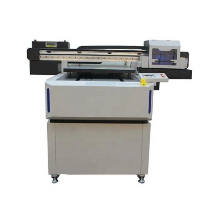 China Indoor Outdoor Advertisement Digital Inkjet printer agent price 6090 uv flatbed printer dtf printer for sale