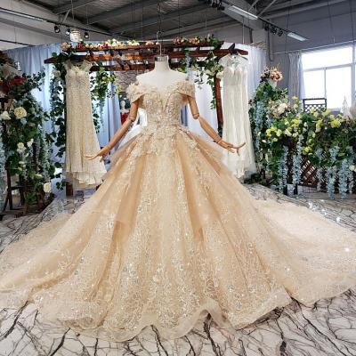 China Luxury Off-the-Shoulder Sleeve Ball Gown Anti-Static Champagne Wedding Dress for sale