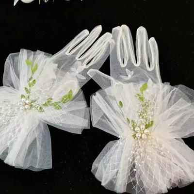 China ELBOW Accessories Elegant Short Tulle Mittens Lace Up Beads For Wedding for sale