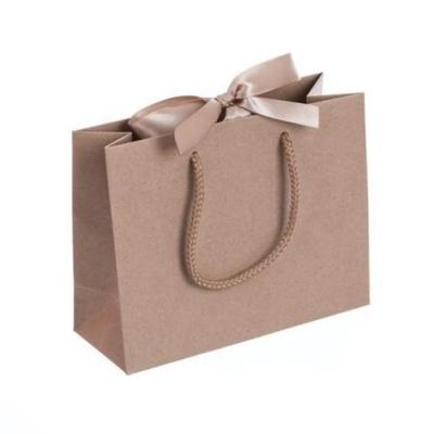 China Postman Manufacturing Recyclable Recycled Individual Logo Waterproof Paper Shopping Gift Bag With Handle String for sale