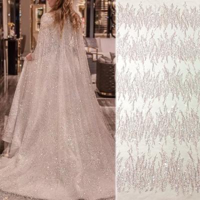 China Other Style Design Romantic Vitas Custom Line Soft Pink Heavy Beaded Tulle Lace Fabric With Sequins For Bridal Dress for sale