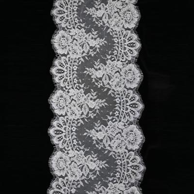 China Soft Exquisite Style Design Flower Trim Embroidery With Beaded French Lace Fabric For Bridal for sale