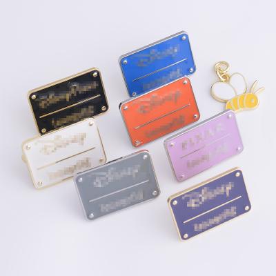 China OEM ODM Color Glue Metal LOGO Tag Custom Engraved Metal Labels For Handbags Eco-Friendly Brand Logo Labels For Handbags for sale