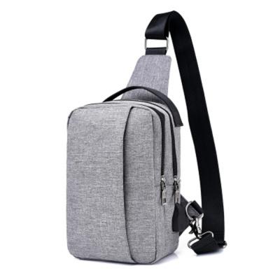 China Newspaper Used New Design Sling Bag Cross - USB Men's Anti Theft Body Shoulder Chest Backpack Canvas Trunk Bag for sale