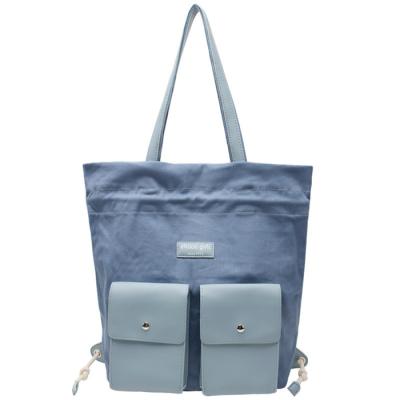 China New Korean Cotton Summer Shoulder Bag Female Large Capacity Packing Canvas Drawstring Backpack for sale