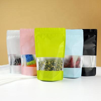 China ANTI-STATIC Custom Printed Colors Rack Up Pouch With Clear Stand Up Zipper Window Packaging Bags For Nuts for sale