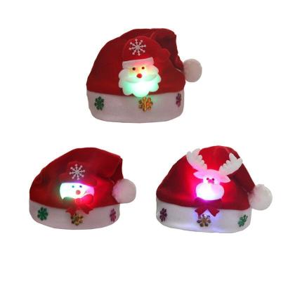 China Santa Embroidered Christmas Glowing LED Christmas Holiday Decorations Cartoon Snowman Reindeer Santa Hat with Light for Kid and Adults for sale