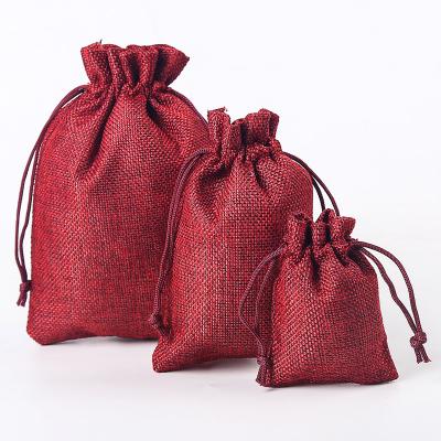 China Hot Sale Custom Jute Logo Dust Small Jute Multiple Colors Gift Shopping Drawstring Bag for sale