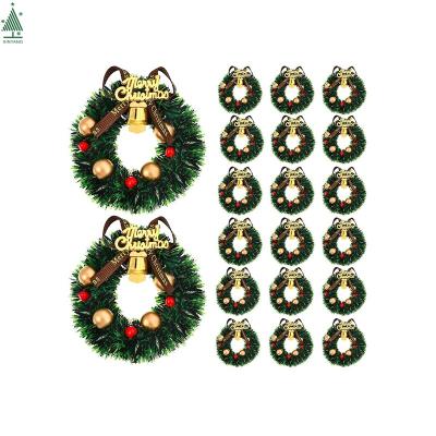 China Miniature Christmas Decoration 6cm Christmas Wreath Garland Christmas Decoration with Bowknot and Bell Dollhouse Decoration for sale