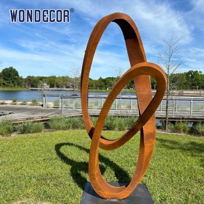 China Modern Large Outdoor Abstract Ring Ribbon Weathering Steel Sculpture for sale