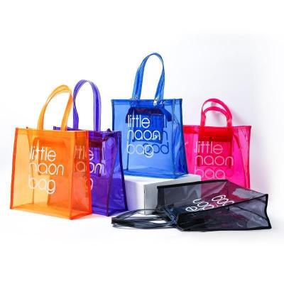 China 2022 Large Fashion PVC Water Proof Tote Bag Clear Beach Bag Plastic Shopping Bag With Own Logo for sale