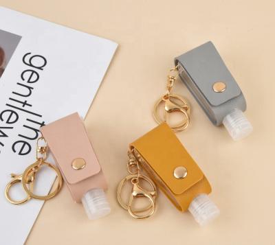 China High Quality Customized Leather Mini Travel Spray Squeeze Bottle Holder Key Chain With Tassel for sale