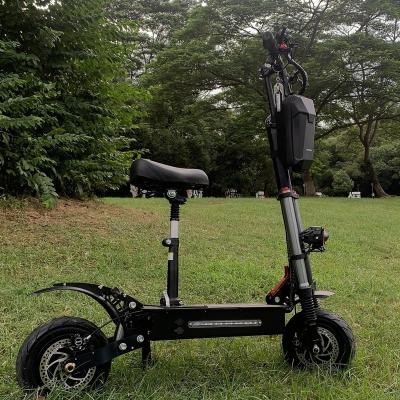 China Unisex High Power 60v 11 Inch 85km/h Riding 45 Degree Dual Motor Off Road Electric Scooter 5600w for sale