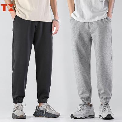 China Anti-Static Custom French Terry Loose Cotton Sweatpants Logo Simple Gray Casual Sweatpants for sale