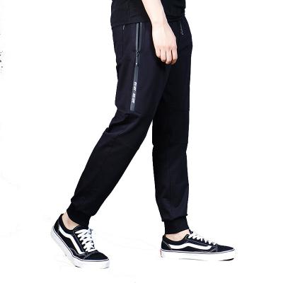 China Anti-pilling Mens Sweatpants With Side Zipper Pockets Cotton Track Pants Men Jogging Pants for sale