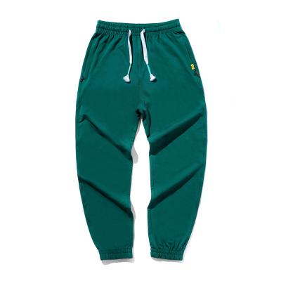 China Custom size cotton anti-pilling on cheap trackies sweatpants branded trackers for sale