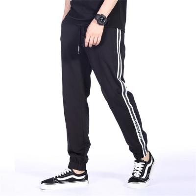 China Custom Color Mens Fitness Joggers Sports Pants Anti-pilling Design Loose Striped Black White for sale