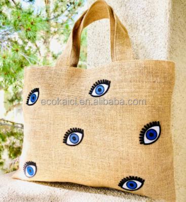 China Natural Canvas Sublimation Handled Evil Eye Hemp Beach Bag Viable Travel Jute Tote Bag for sale