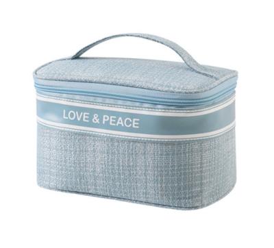 China Lovepeace Portable Large Volume Cosmetic Makeup Bag Travel Bag Polyester Storage Care Bags For Women for sale