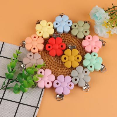 China 100% Non-Toxic Silicone Baby Pacifier Wholesale Food Grade Flower Teether Multicolor Clips for sale