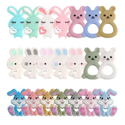 China As 2022 New Cartoon Image Dinosaur Baby Silicone Teether Animal Food Rodent BPA Free Silicone Teeth Nursing Pacifier Clip Silicone Bead for sale