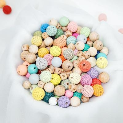 China Toy Wholesale Soft Beech 138 Color Rings Teether Baby Bracelet Hand Hook Natural Wooden Beads for sale