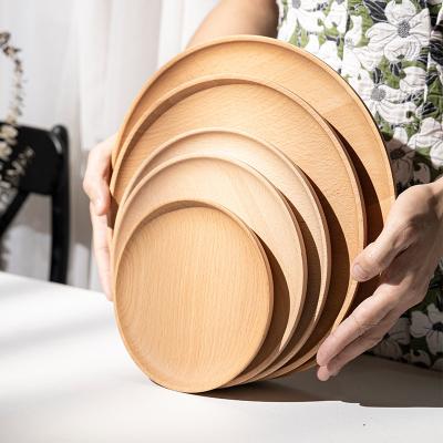 China Sustainable Factory Price Custom Logo Durable Light Brown Round Beech Wood Dinner Plate For Food for sale