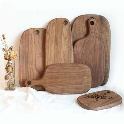 China Sustainable 2023 New Wooden Tray Kitchen Wooden Cutting Board Set Factory Direct Price Preferential Black Walnut Cutting Board for sale