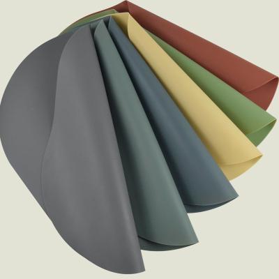 China Viable Leather Texture Oval Silicone Dining Mat Silicone Placemat for sale