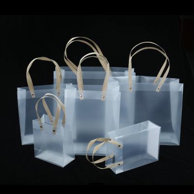 China Custom Logo Clear Transparent Waterproof Festival Package for Gifts Pp Plastic Handle for sale