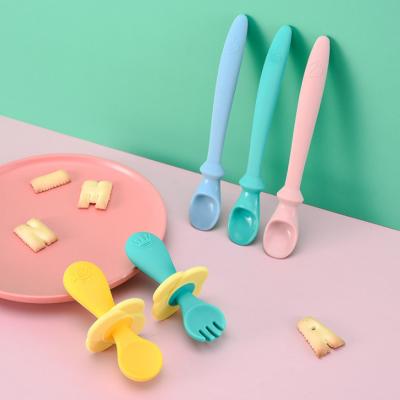 China Latex Free Baby Learn To Eat Spoon Fork Soft Silicone Practicing Spoon Licking Spoon Fork Set Baby Extra Feeding Cutlery for sale