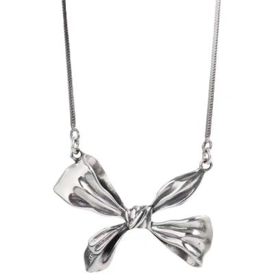 China Fashion CLASSIC Bow Products Liquid Silver Butterfly Necklace Stainless Steel Pendant Customization for sale