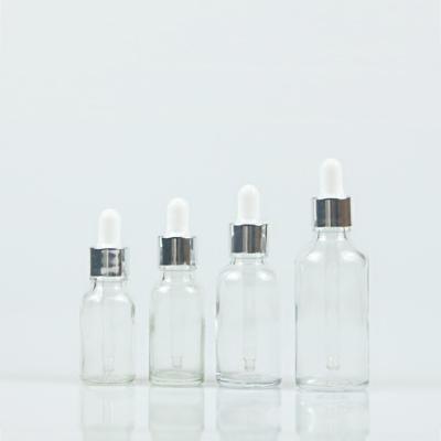 China Personal Care Skin Care Dropper Bottle 15ml 20ml 30ml 50ml Essential Oil Packing Glass Bottle With Silver Cap for sale