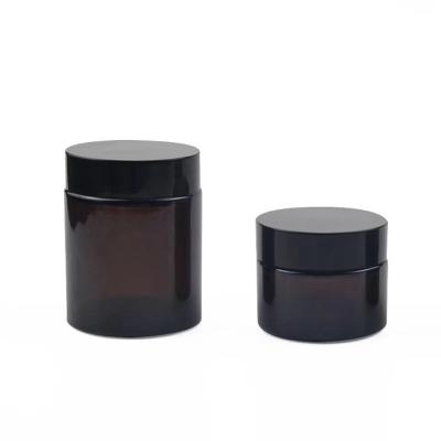 China 30g 100g Refillable Amber Glass Jars Empty Cosmetic Glass Jar Body Face Cream Jar With Amber Lid for sale