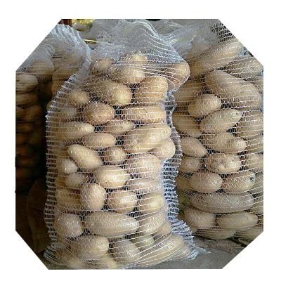 China Agriculture fresh vegetable plastic bag with holes raschel mesh drawstring bag for potato onion 5kg 10kg 40kg for sale