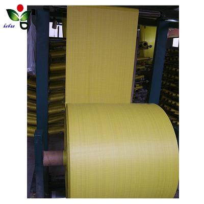 China Recyclable White Yellow Red PP Woven Fabric In Roll Bag Packing for sale