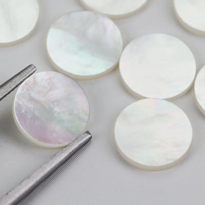 China Double Color Game Or Fire Shell Natural White Celluloid Flat Pearl Round Price for sale