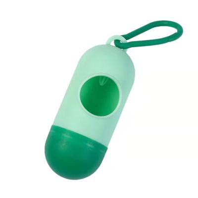 China Clean and Hygienic Pet Viable Portable Pill Shaped Dispenser Pet Cat Poop Bag Holder for sale