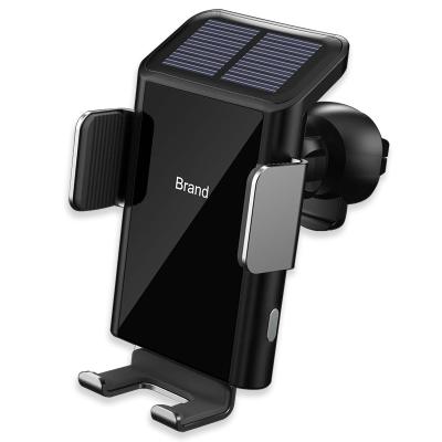 China Adjustable Built-in Battery Solar Power Supply Car Mounted Mobile Universal Car Phone Holder for sale