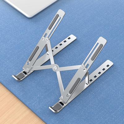 China 10-15.6 Inch Ergonomic Size Notebook Stand Riser Aluminum Alloy Flexible Adjustable Folding Laptop Stand With Good Quality for sale