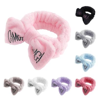 China Over 100 Fashionable Colors and Designs Soft Rabbit Bunny Ear Makeup Headband Plush Bow Knot Towel Hairband Spa Headband for sale