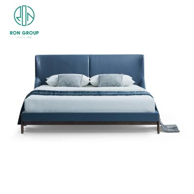 China Modern Luxury Modern Bedroom Furniture Upholstered Real Leather Italian Bed With Extended Headboard King Size White Leather Bed for sale