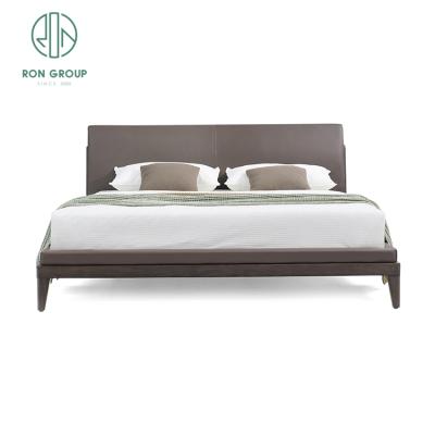 China Modern Luxury Modern Bedroom Furniture Upholstered Real Leather Italian Bed With Extended Headboard King Size White Leather Bed for sale