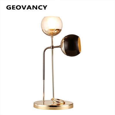 China Modern luxury modern metal bed room lving glass E14 black and gold modern table lamp for sale