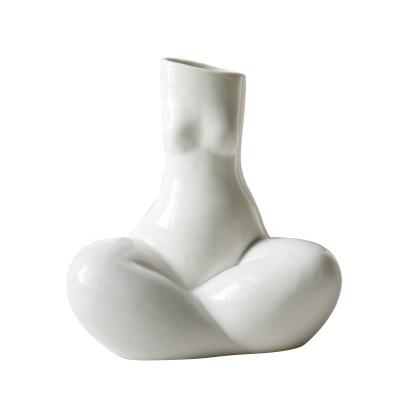 China Eco-friendly Nordic White Ceramic Flower Vases Simplicity Irregular Shaped Tabletop Flower Vase For Home Decor for sale