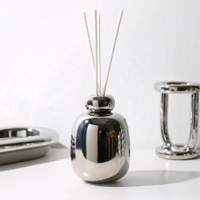 China Excellent Quality Eco-friendly Ceramic Aromatherapy Empty Scent Diffuser Oil Bottles Decorative Reed Diffuser for sale