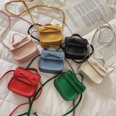 China Cute Fashion Bowknot Leather Purse Shoulder Bag PU Coin Pouch Kids Money Holder Bag Fashion Kids Handbags For Girls for sale