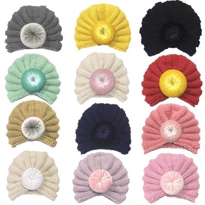 China Baby Hat Baby Solid Color Donut Hat Style Striped Knitted Bohemian Hat for sale