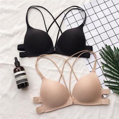 China Sexy Antibacterial Bras Push Up Front Closure Women's Girl's Seamless Solid Color Bra Lingerie Cross Adjustable Strap Gathering Bra for sale